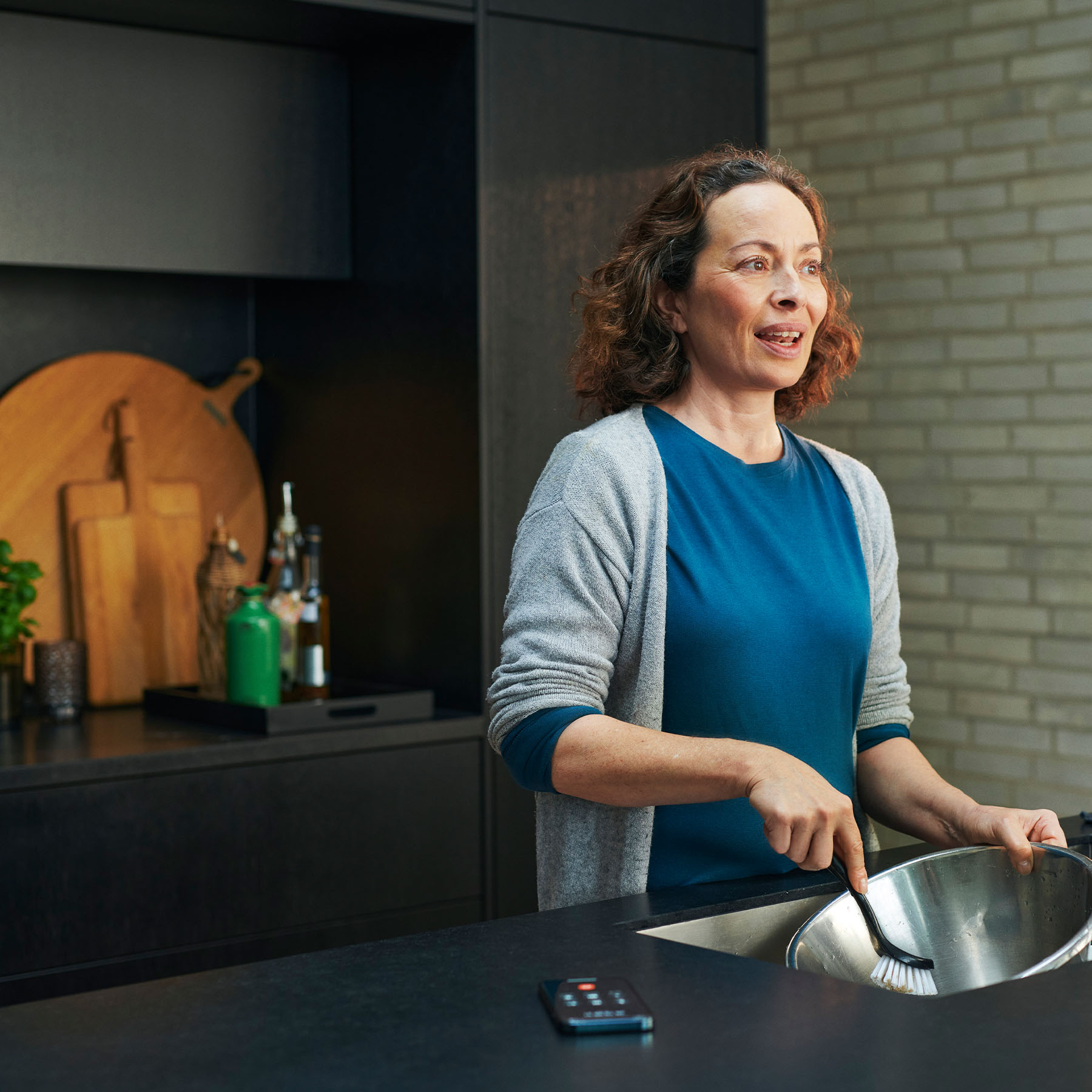 resound one hearing aids washing dishes while talking on the phone